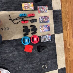 Nintendo Switch Joy-Con Controllers, games, accessories, and charging dock